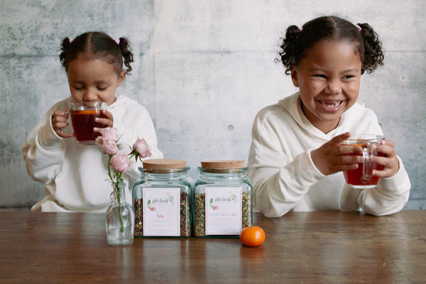 2 young kids drink Ruby Nourishing Blend. Herbal tea for kids. All natural & organic teas. Family friendly, herbalist formulated. 