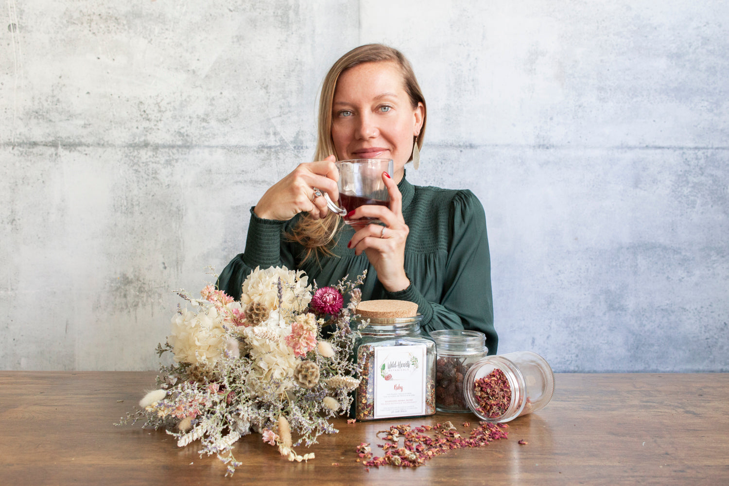 Women drinking Ruby Nourishing Blend Tea. Herbalist and Nutritionist Jazmine Stinson. 